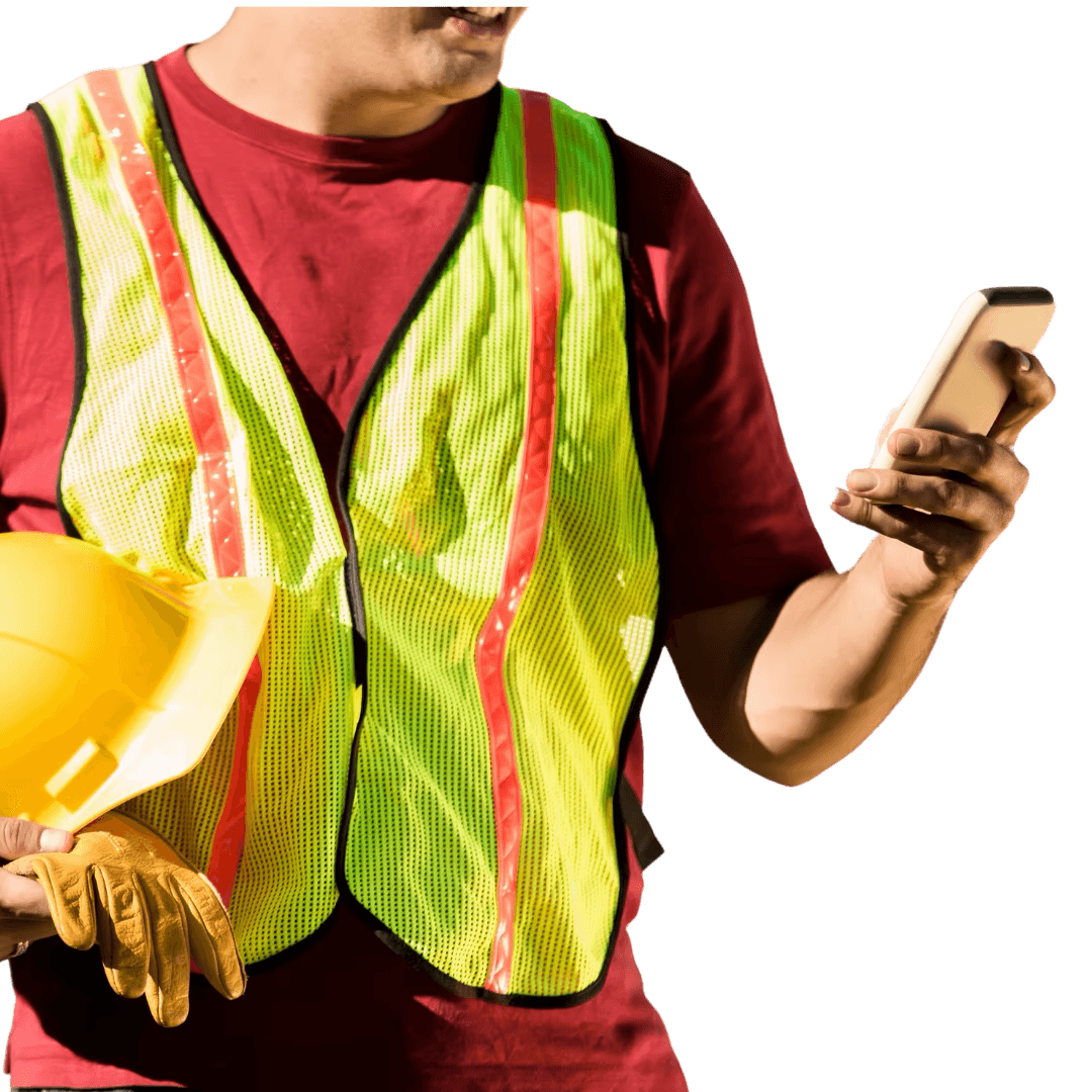 A FOBFLO partner on the jobsite, hard hat and safety vest in one hand, checking a lead notification on his phone